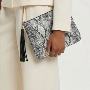 Bergdorf Goodman Snake Skin Clutch with leather tassle.